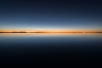 Salt flats at dawn, Salar de Uyuni, Southern Altiplano, Bolivia, South America — стоковое фото