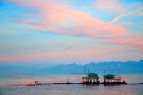 Fishermen home, Tirreno sea at sunrise, Marina Pisa, Tuscany, Italy — Stock Photo
