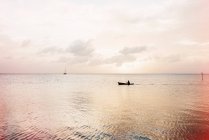 Lone boatman, Caye Caulker, Belize — Stock Photo