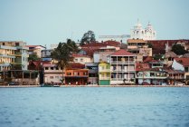 View of waterfront and town, Flores, Guatemala, Central America — Stock Photo