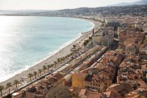 Elevated view of beach and seafront, Nice, France — Stock Photo