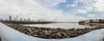 Distant panoramic view of Panama city skyline from waterfront, P — Stock Photo
