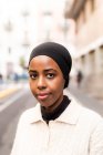 Portrait of young muslim woman in city — Stock Photo