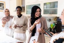 Friends eating dates to break fast — Stock Photo