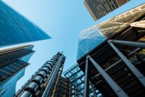 UK, London, Lloyds building and other skyscrapers seen from below — Stock Photo