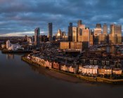 UK, London, Aerial view of Canary Wharf at dawn — Stock Photo