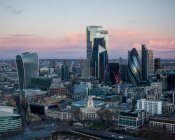 UK, London, Aerial view of The City skyscrapers at awn — стокове фото