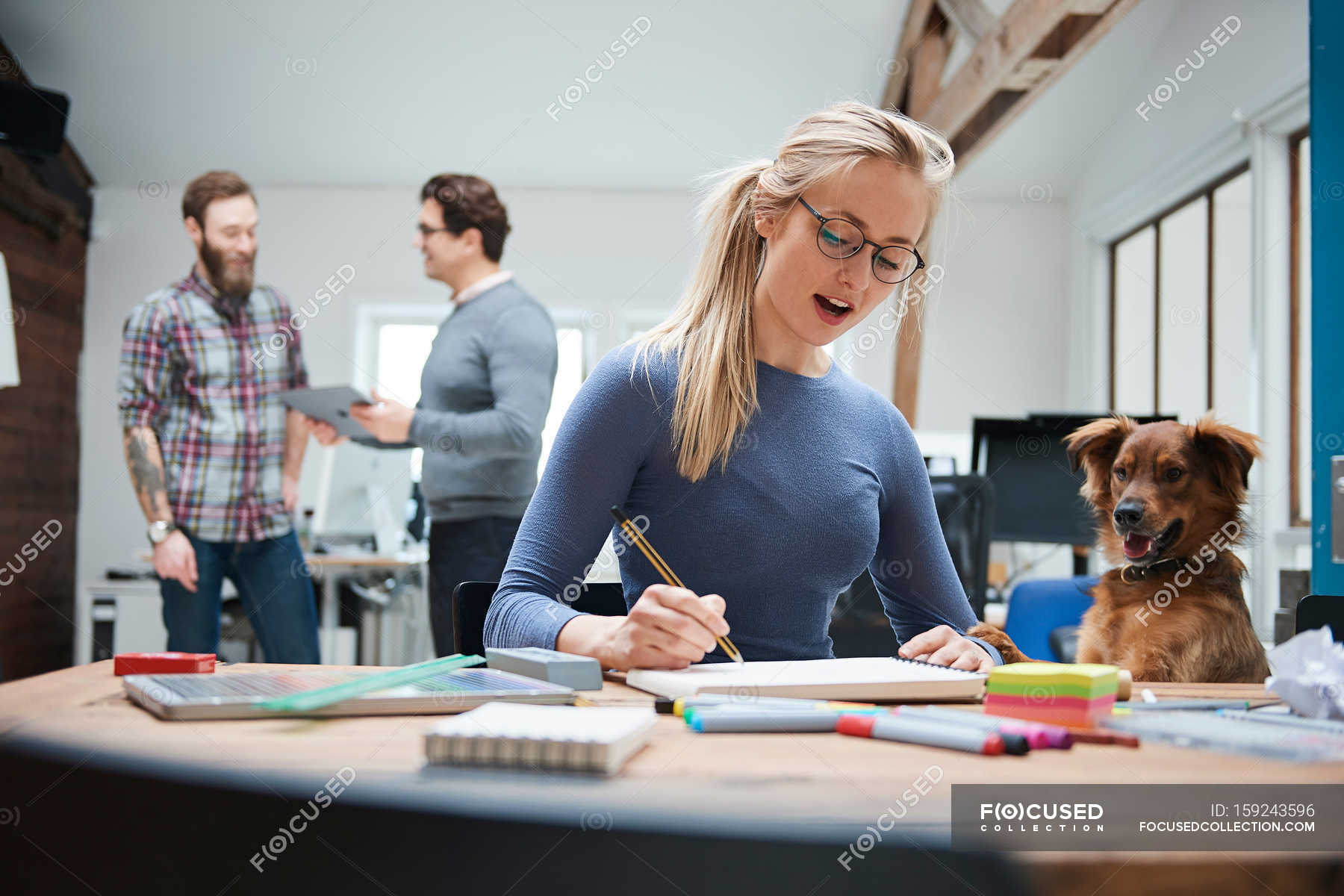 Female Of Designer At Desk With Dog 30 To 34 Years Working
