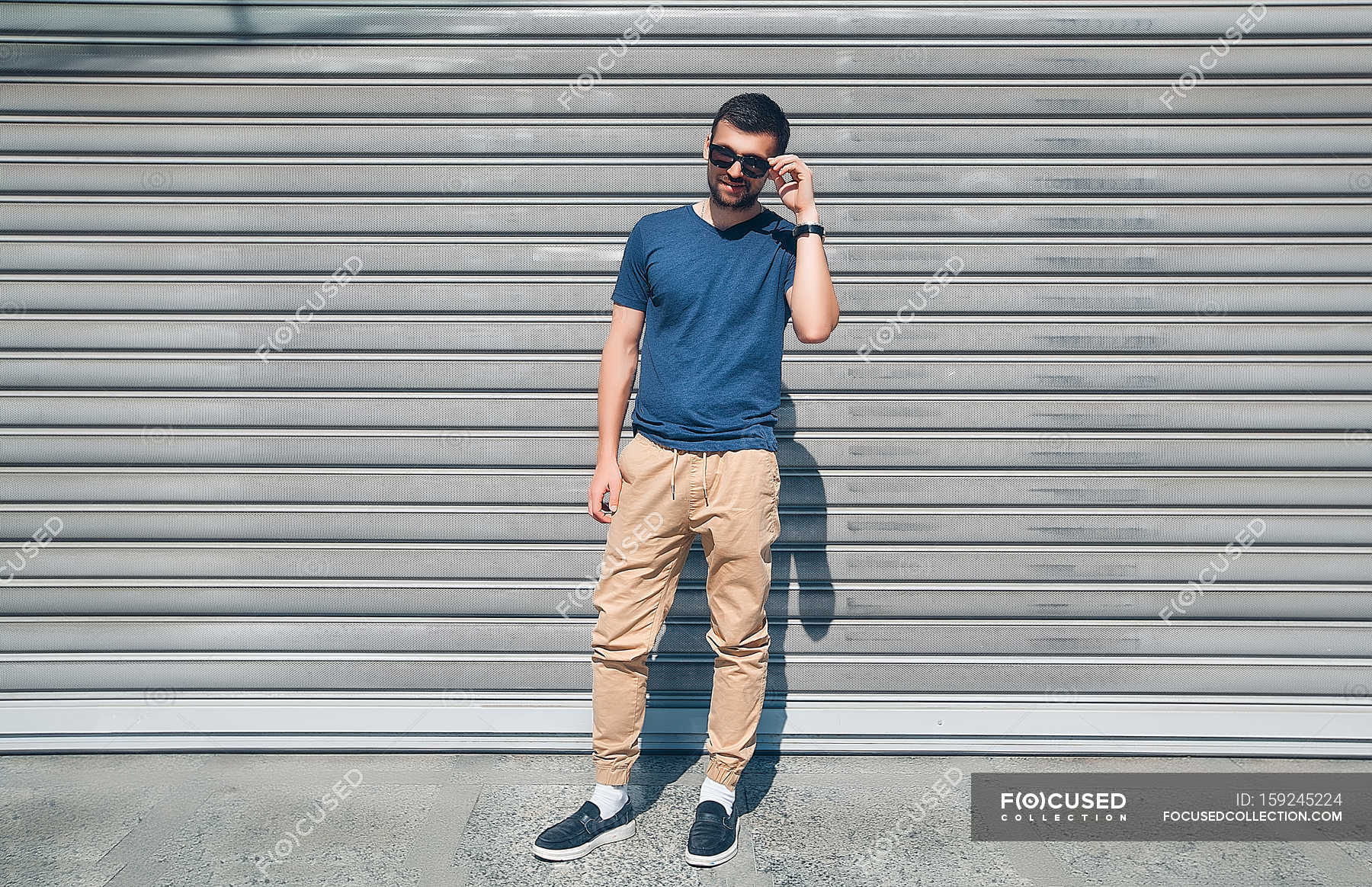 Man standing in front of shutters — turkey country, turkey - Stock ...