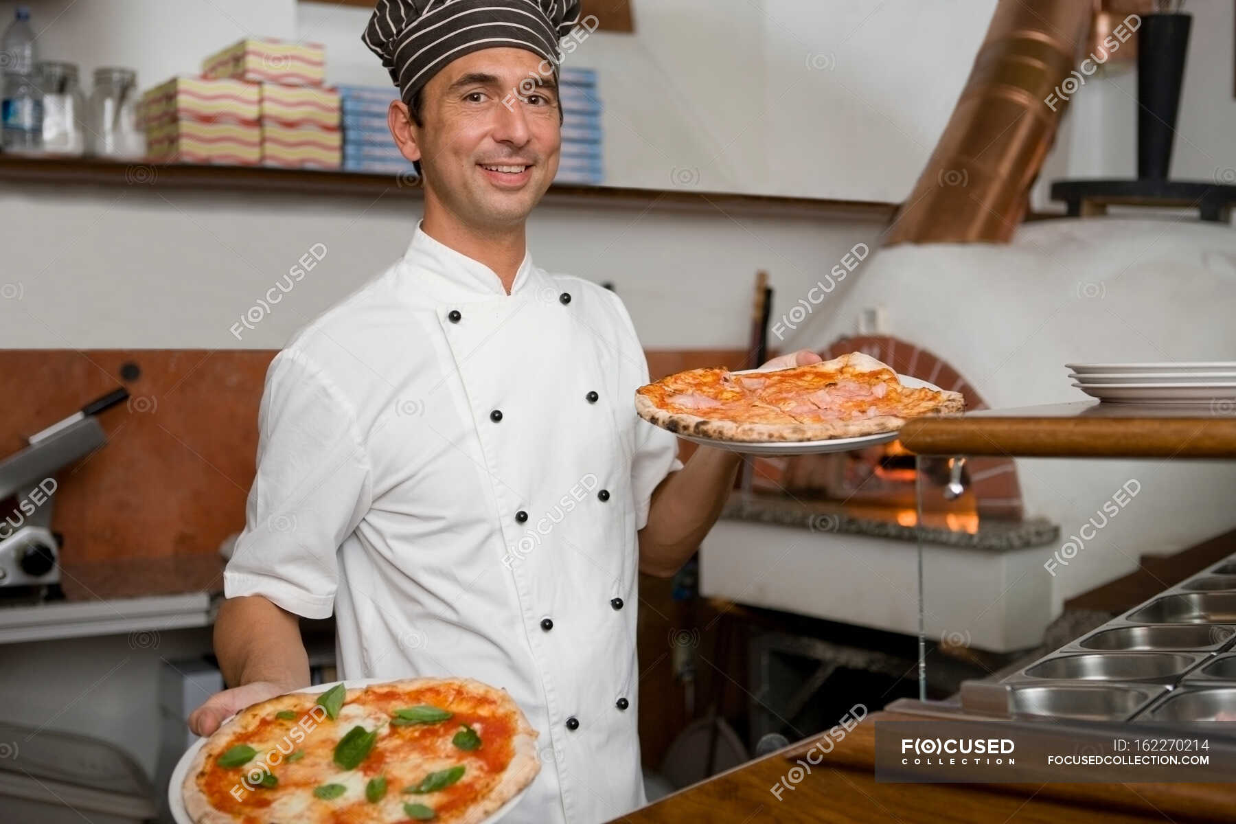 People in a pizzaria — Commercial Kitchen, 35 to 39 years - Stock Photo ...