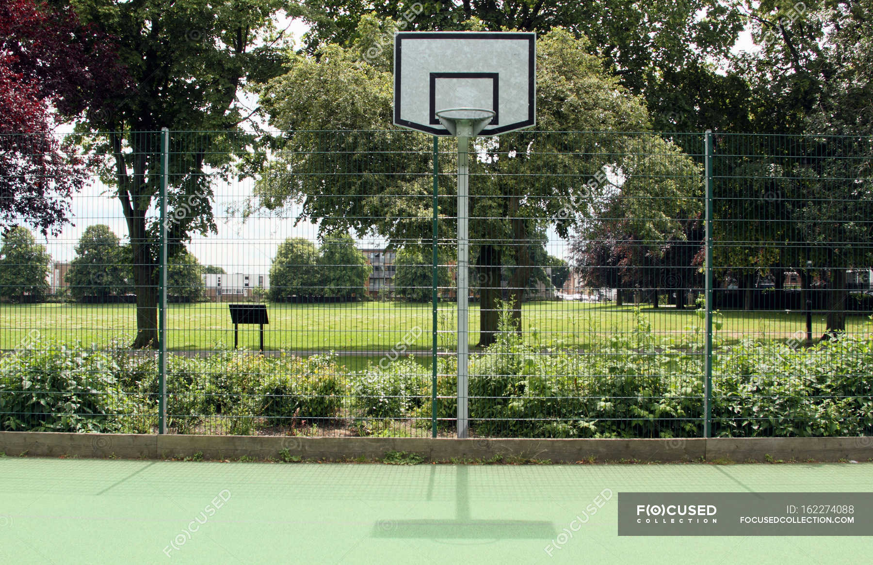 Focused 162274088 Stock Photo Basketball Court In City Park 