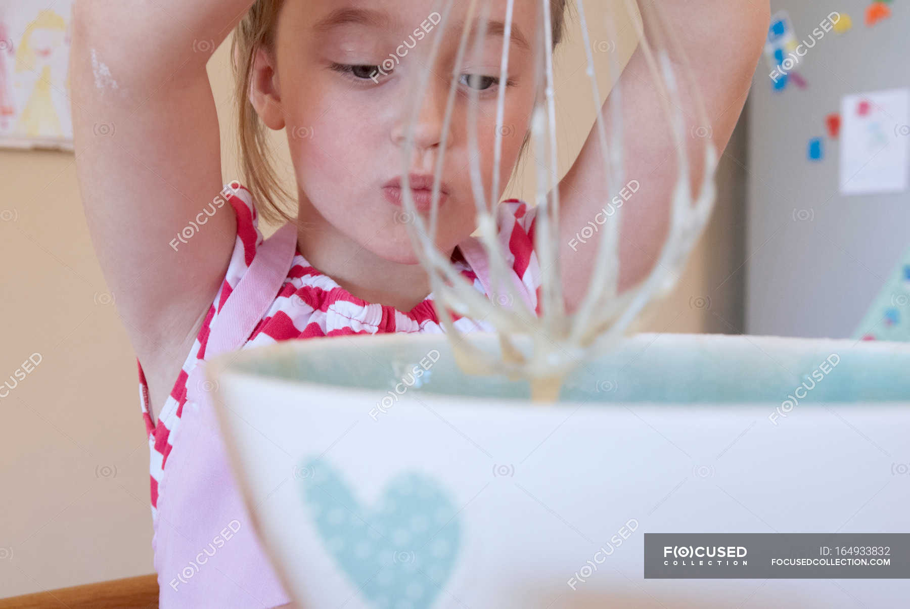 Girl whisking in kitchen — batter, concentration Stock Photo 164933832