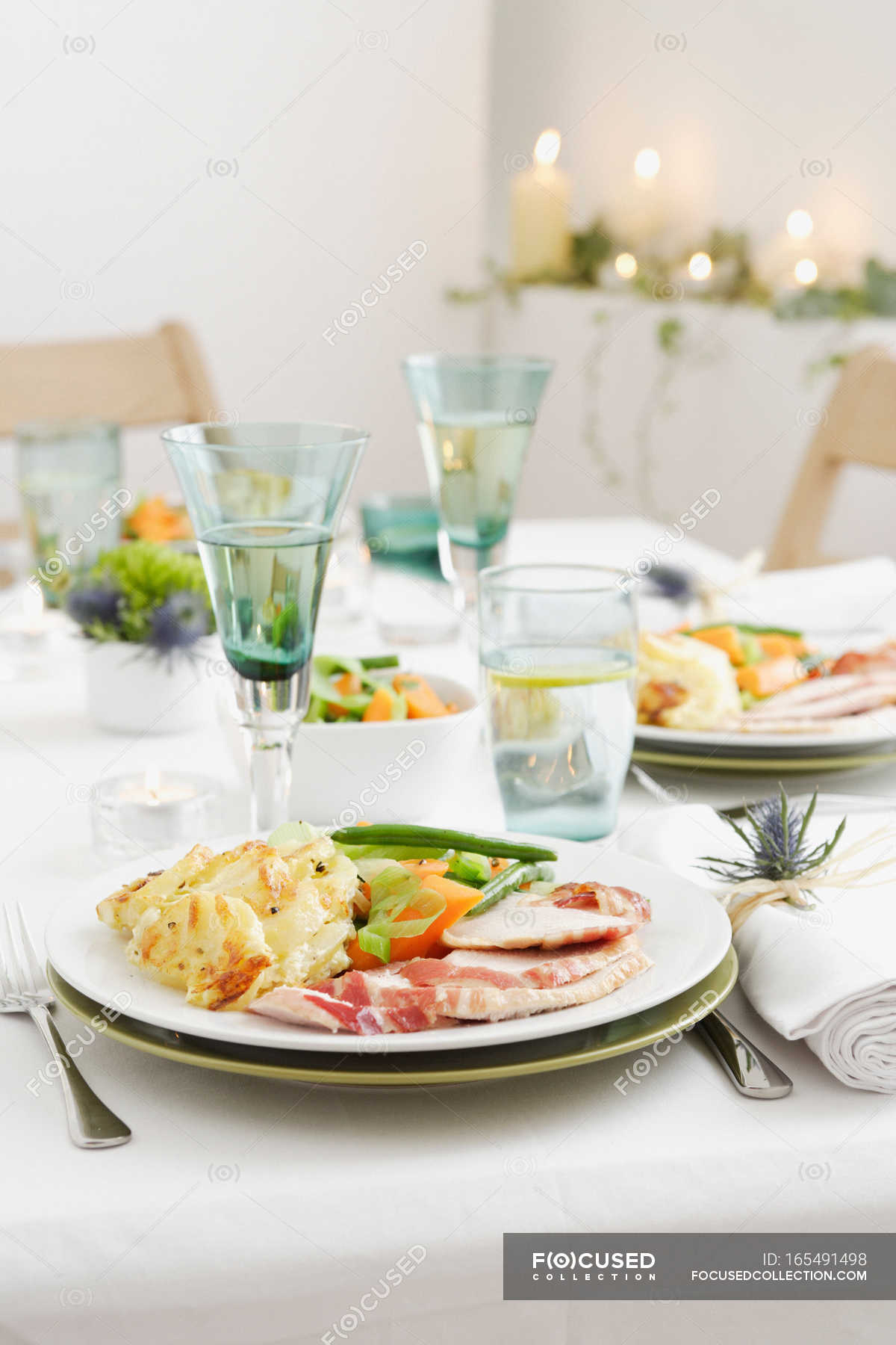 Food on dinner table — leek, chicken - Stock Photo | #165491498