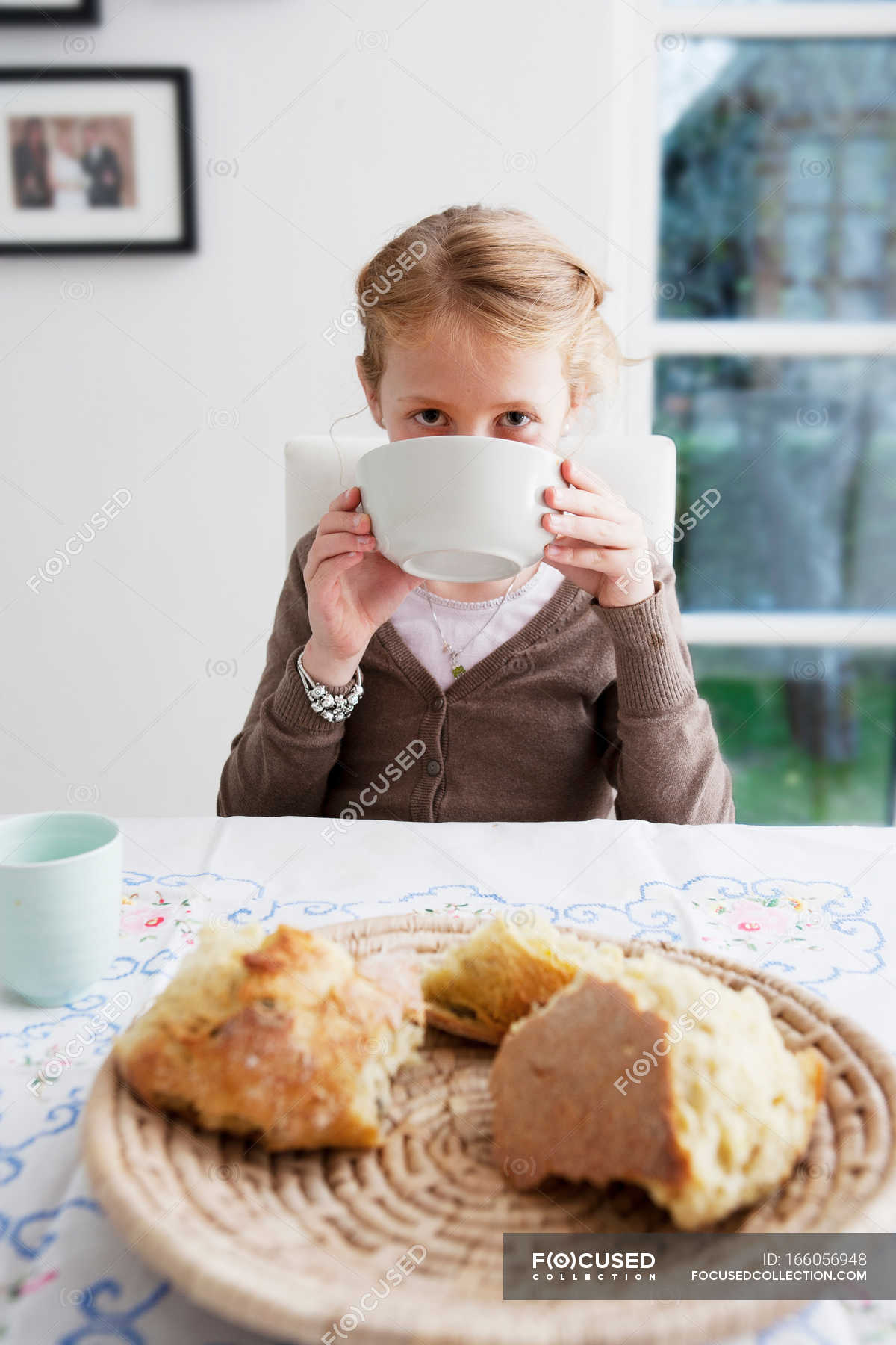 Focused 166056948 Stock Photo Girl Drinking Soup Bowl Table 