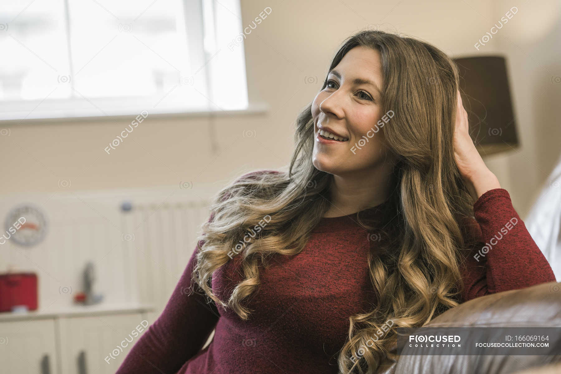 Woman Relaxing At Home And Looking Away Brown Hair One Person