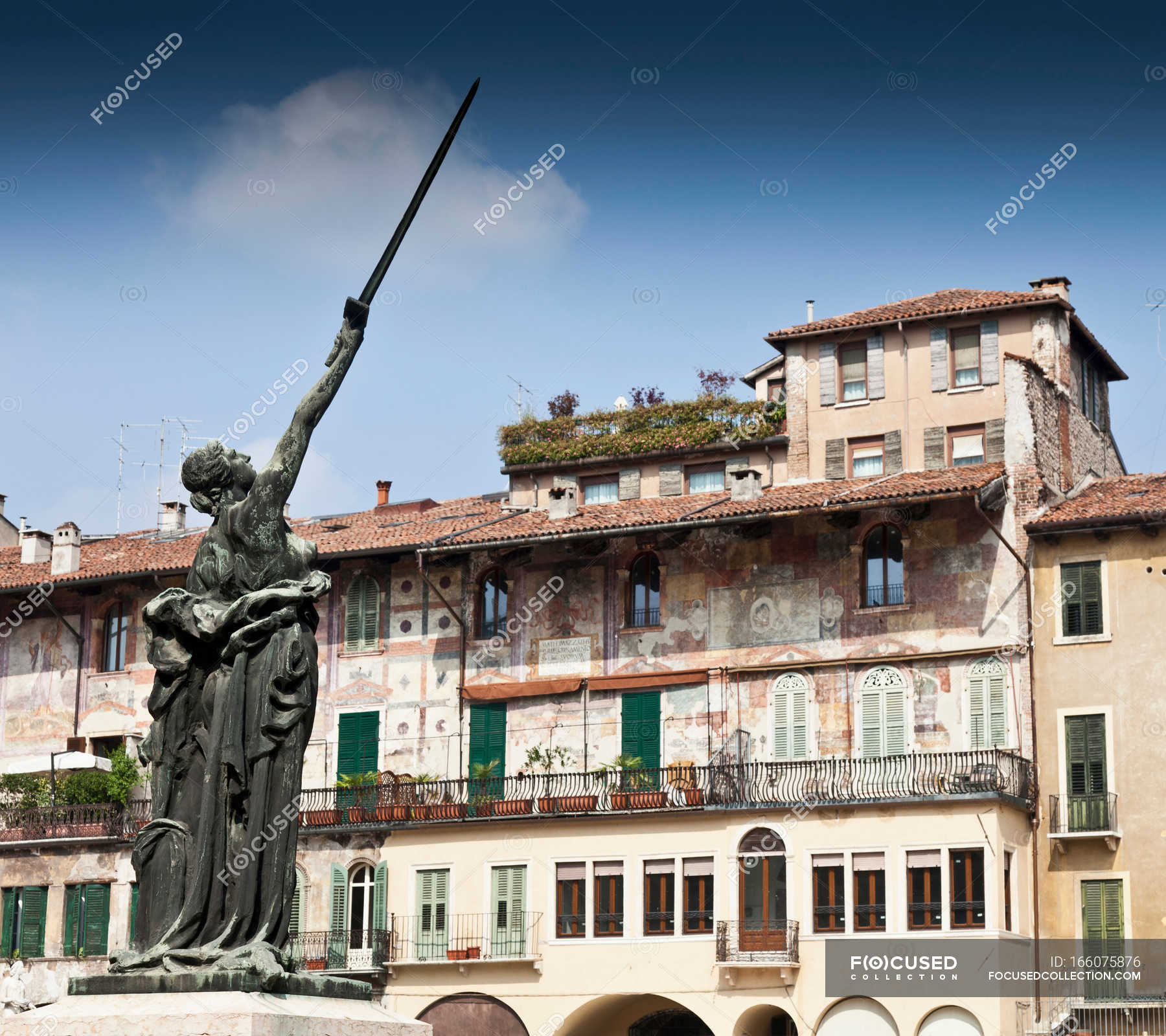 Ornate statue in town square — daylight, architecture Stock Photo 166075876