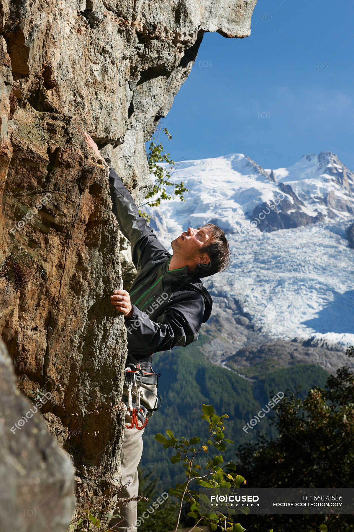 Man rock climbing, Chamonix, Haute Savoie, France — rock climber, mid