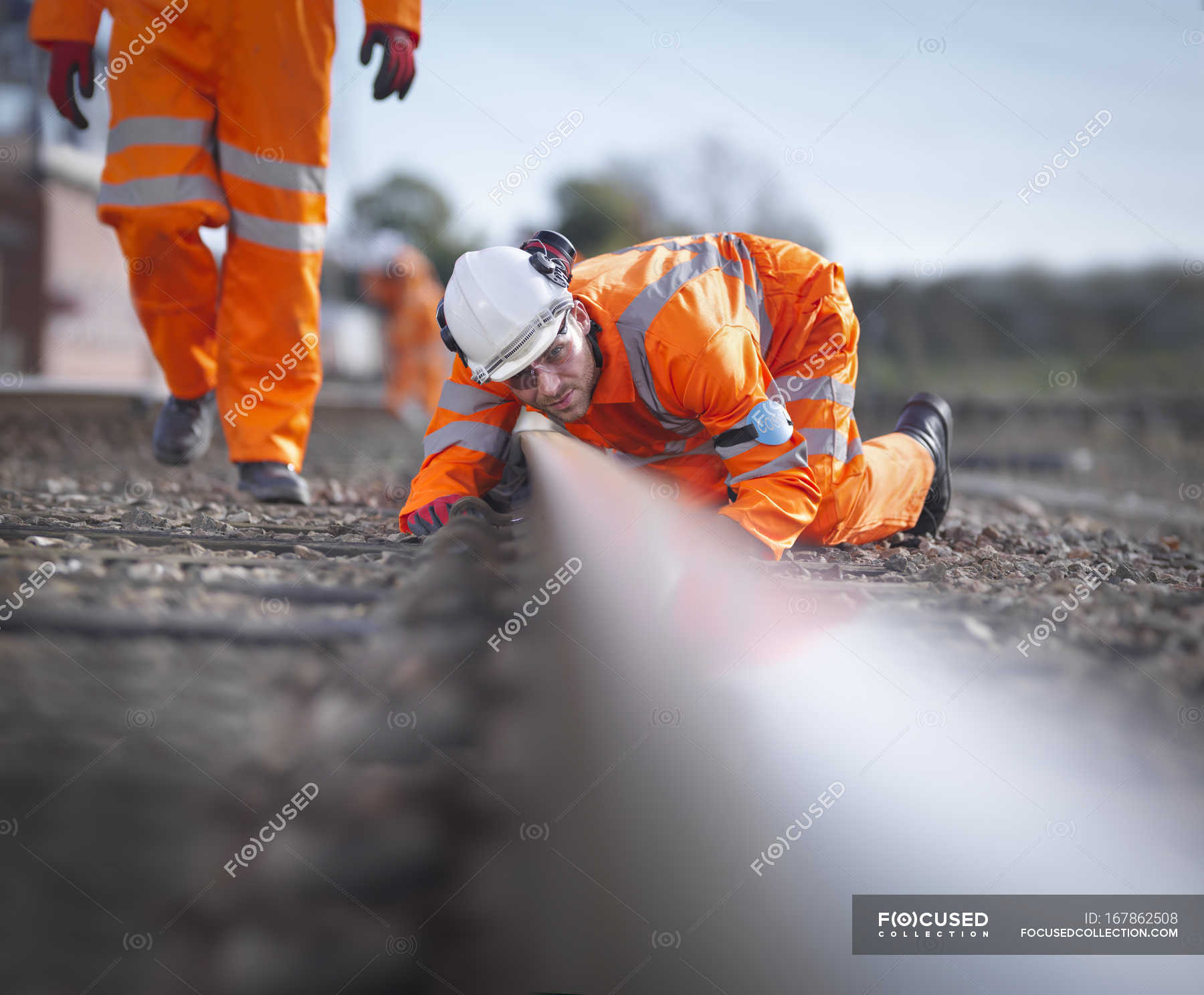 Railway maintenance workers inspecting track in Loughborough, England