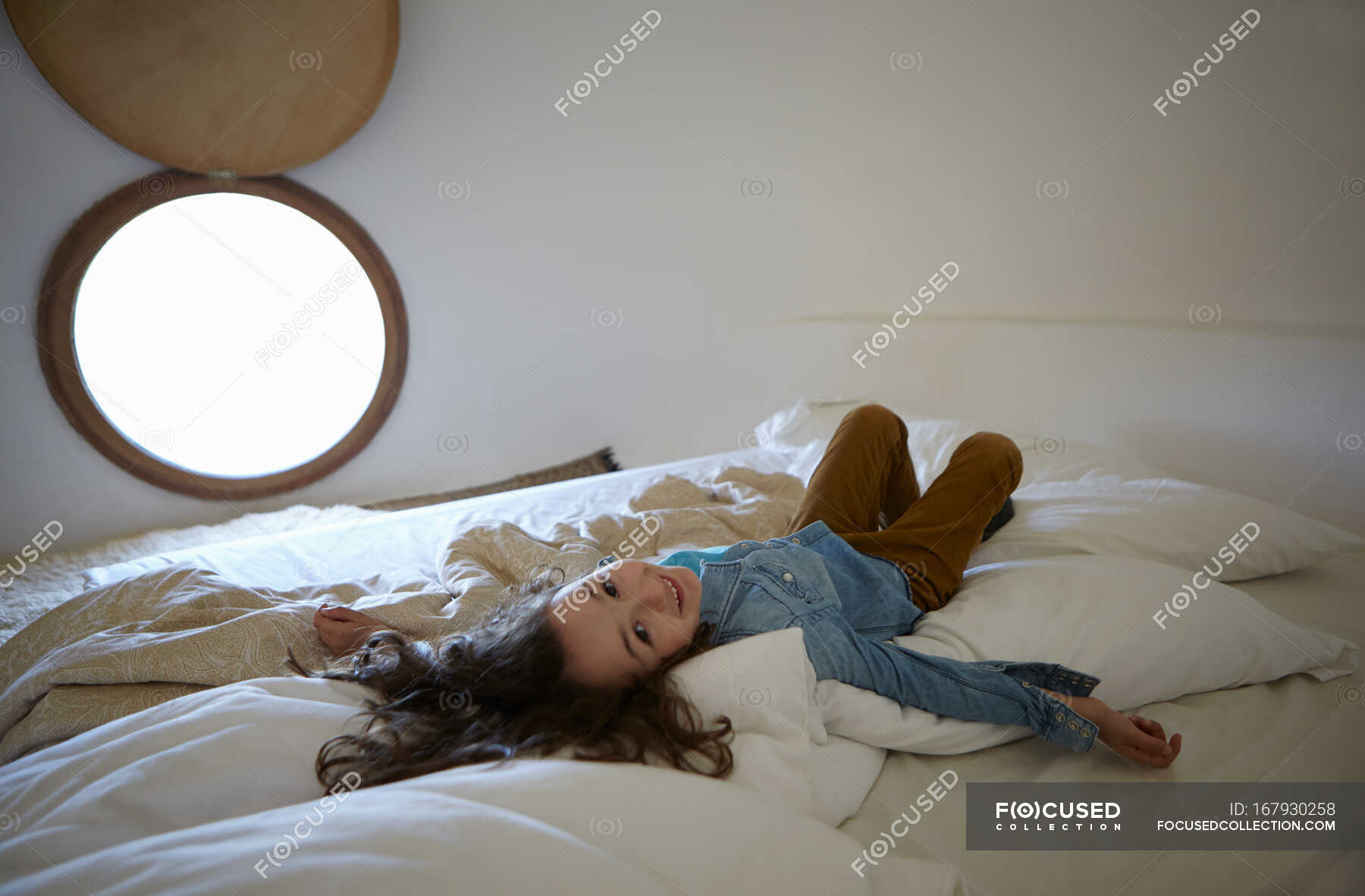 Candid girl in bedroom