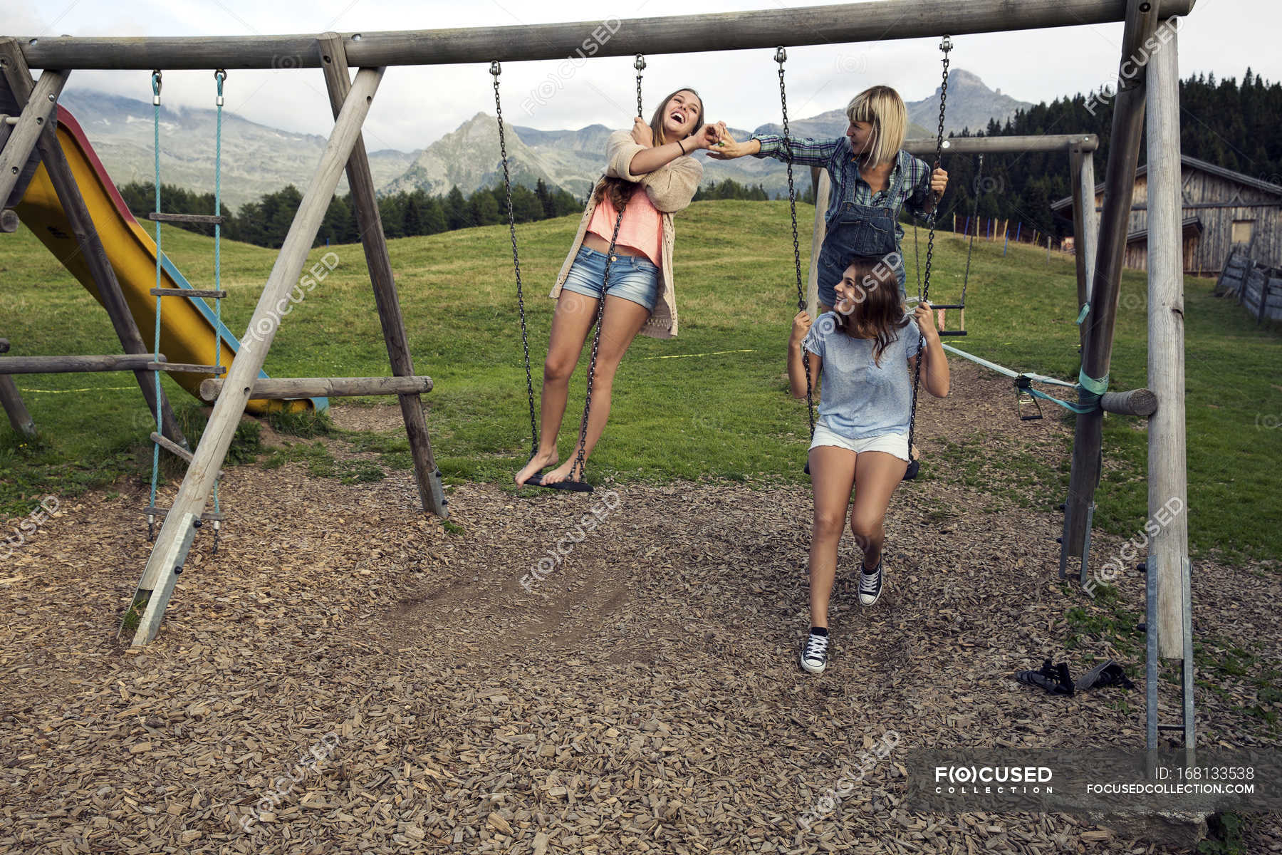 https://st.focusedcollection.com/13397678/i/1800/focused_168133538-stock-photo-three-female-adult-friends-playing.jpg