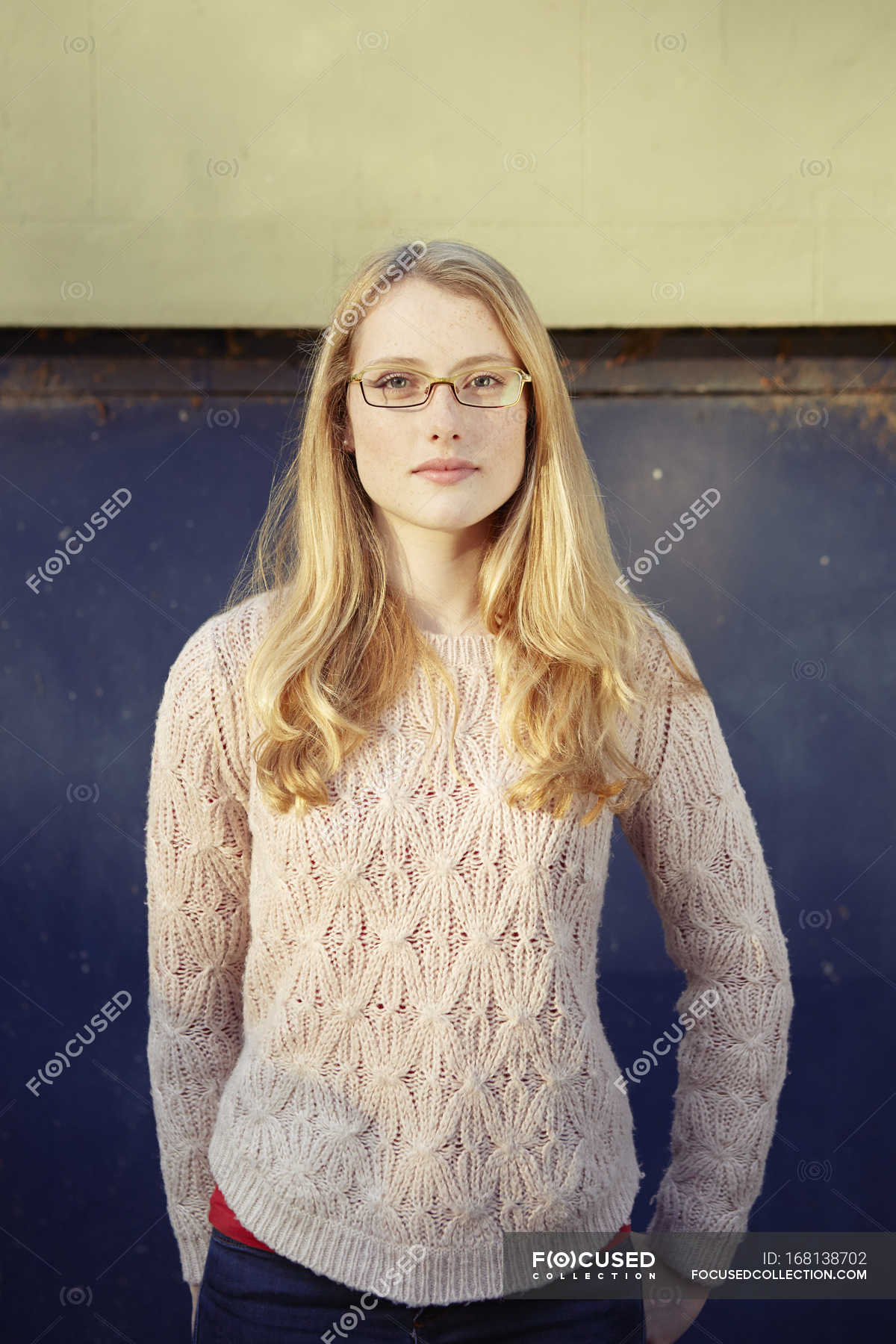 Portrait Of Young Woman Outdoors Long Blonde Hair And Glasses