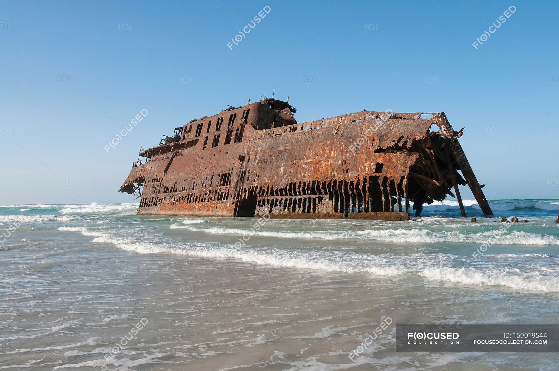 Shipwreck stranded on beach — abandonment, rusting - Stock Photo ...