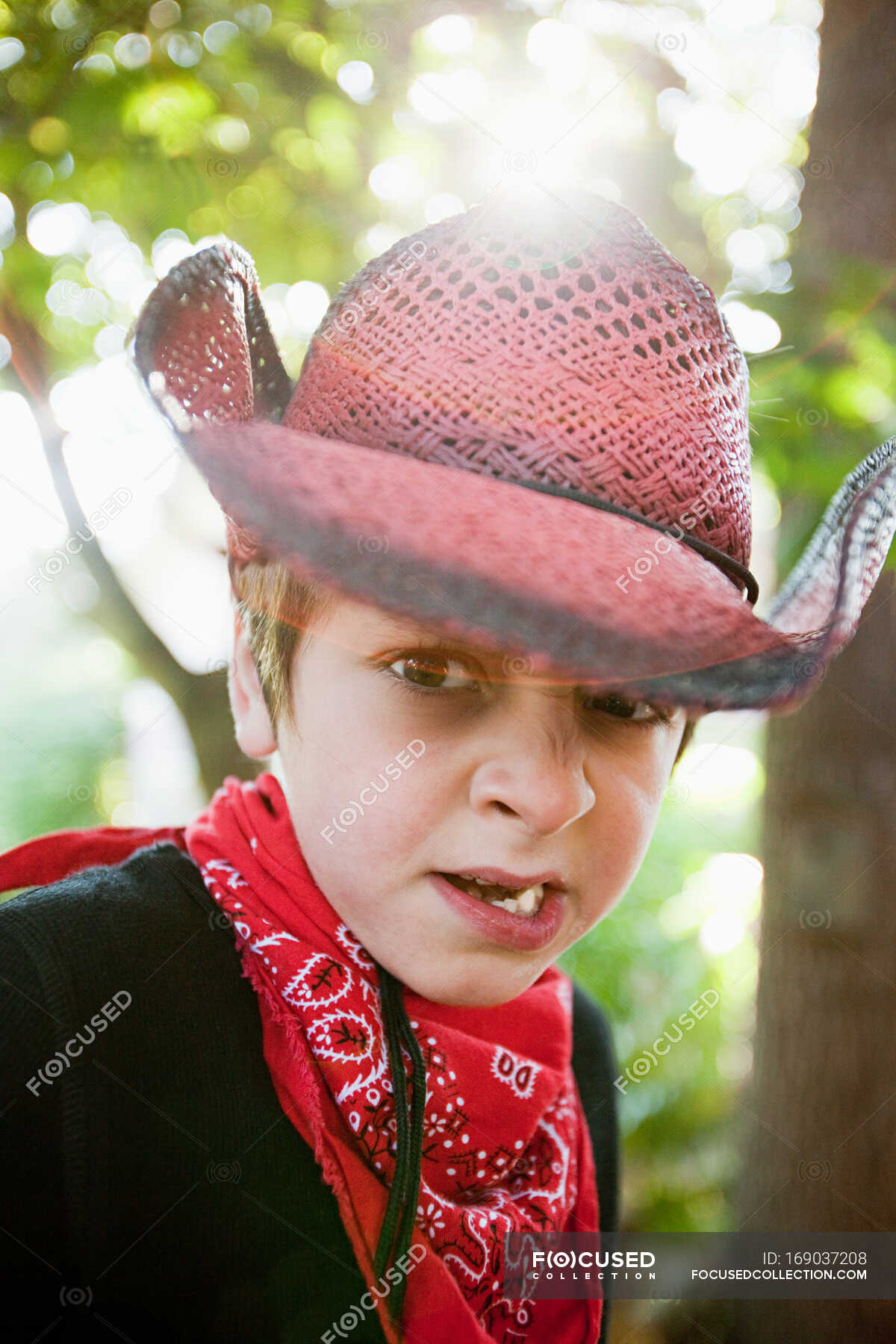 Boy dressed up as cowboy — sunlight, head and shoulders Stock Photo