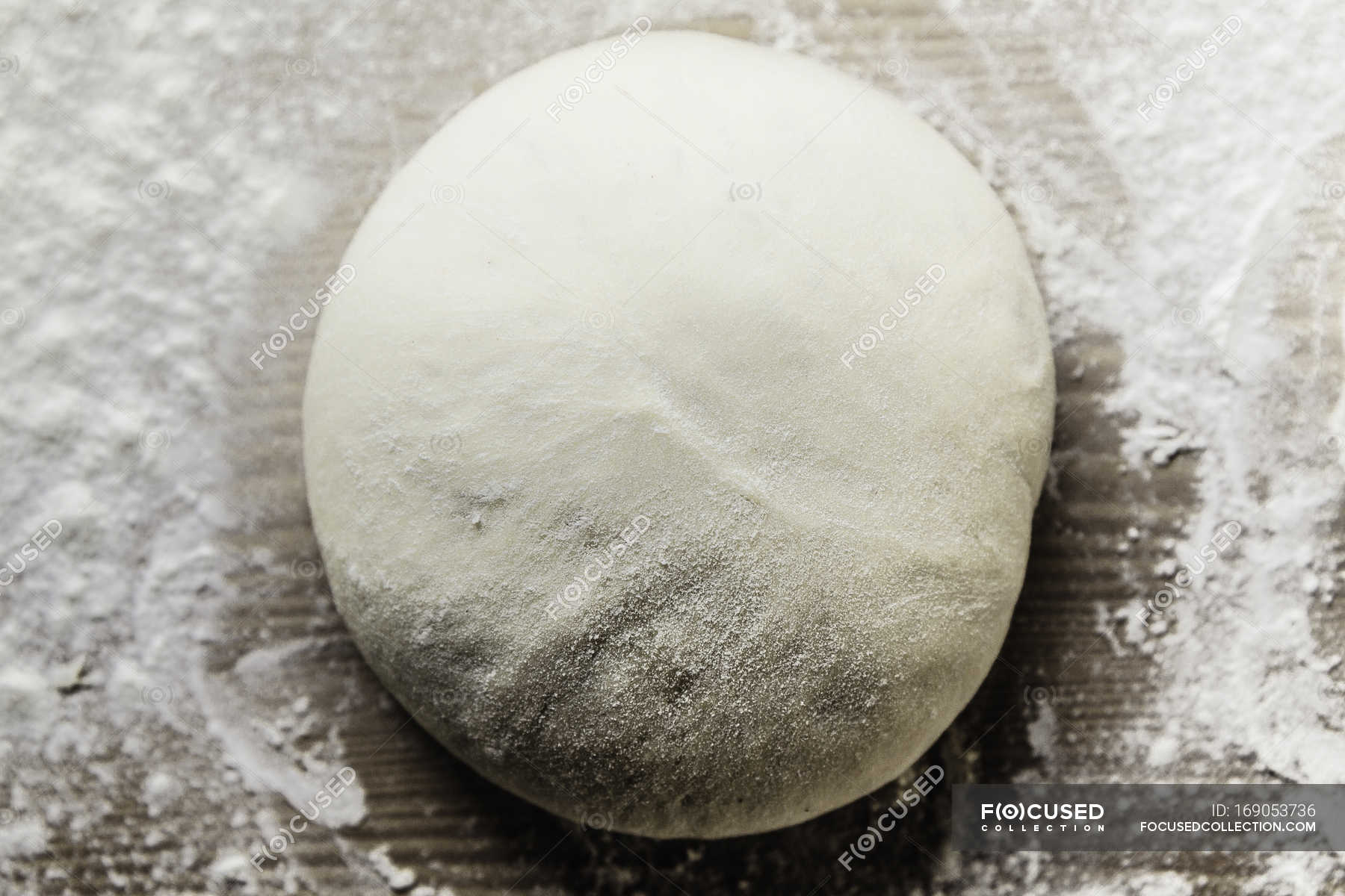 Top View Of Pizza Dough On Wooden Desk Elevated View Raw Stock Photo 169053736