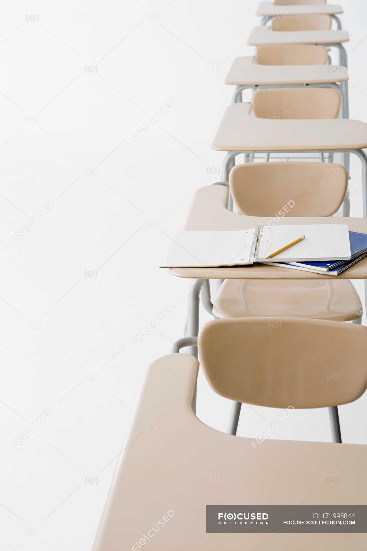 Empty Classroom Desks In A Row White Background Still Life