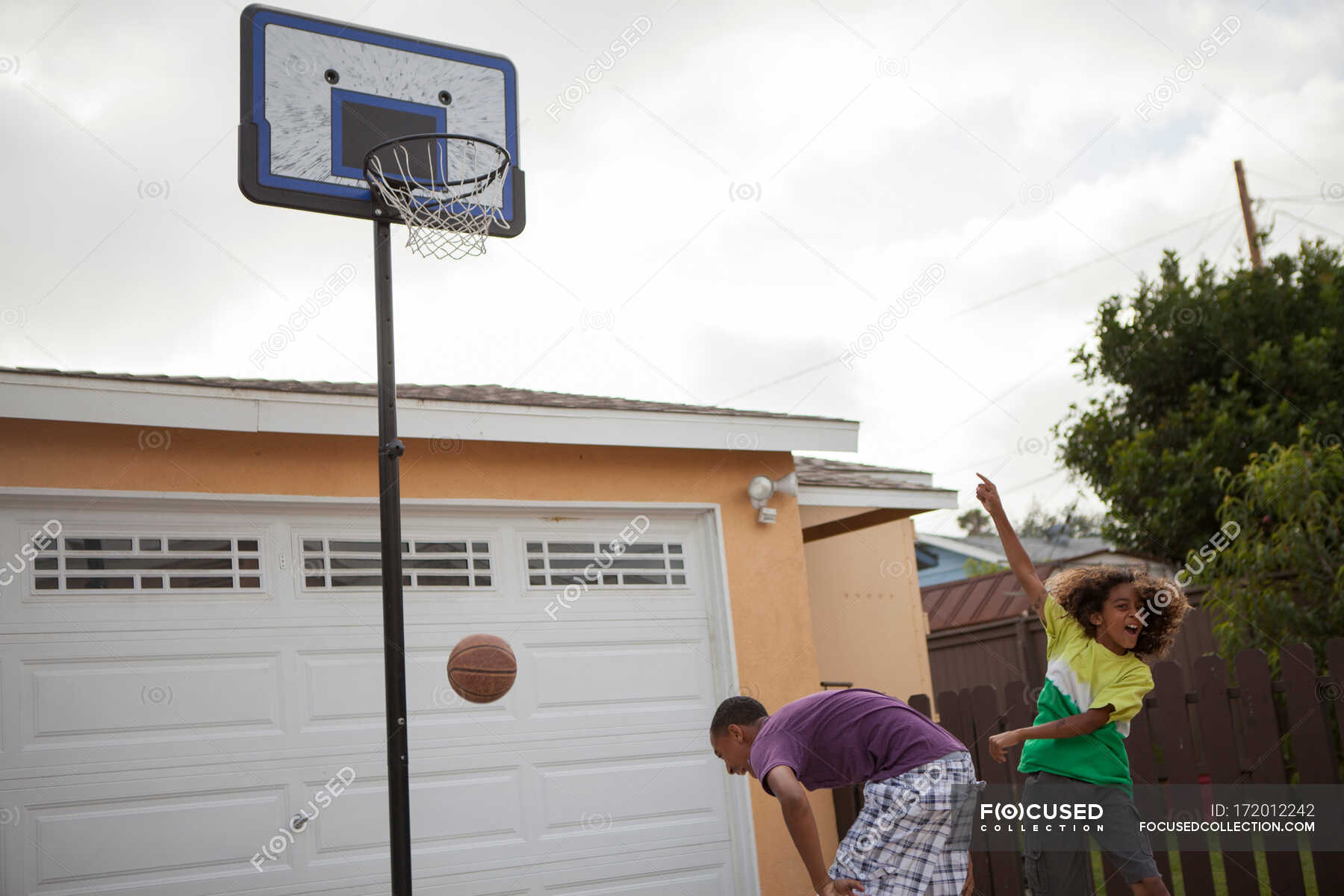 Two brothers playing basketball — male, pre adolescent boy - Stock ...