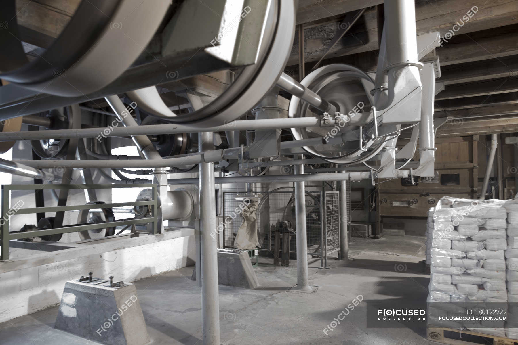 Milling machines in motion at wheat mill — germany, Food Industry