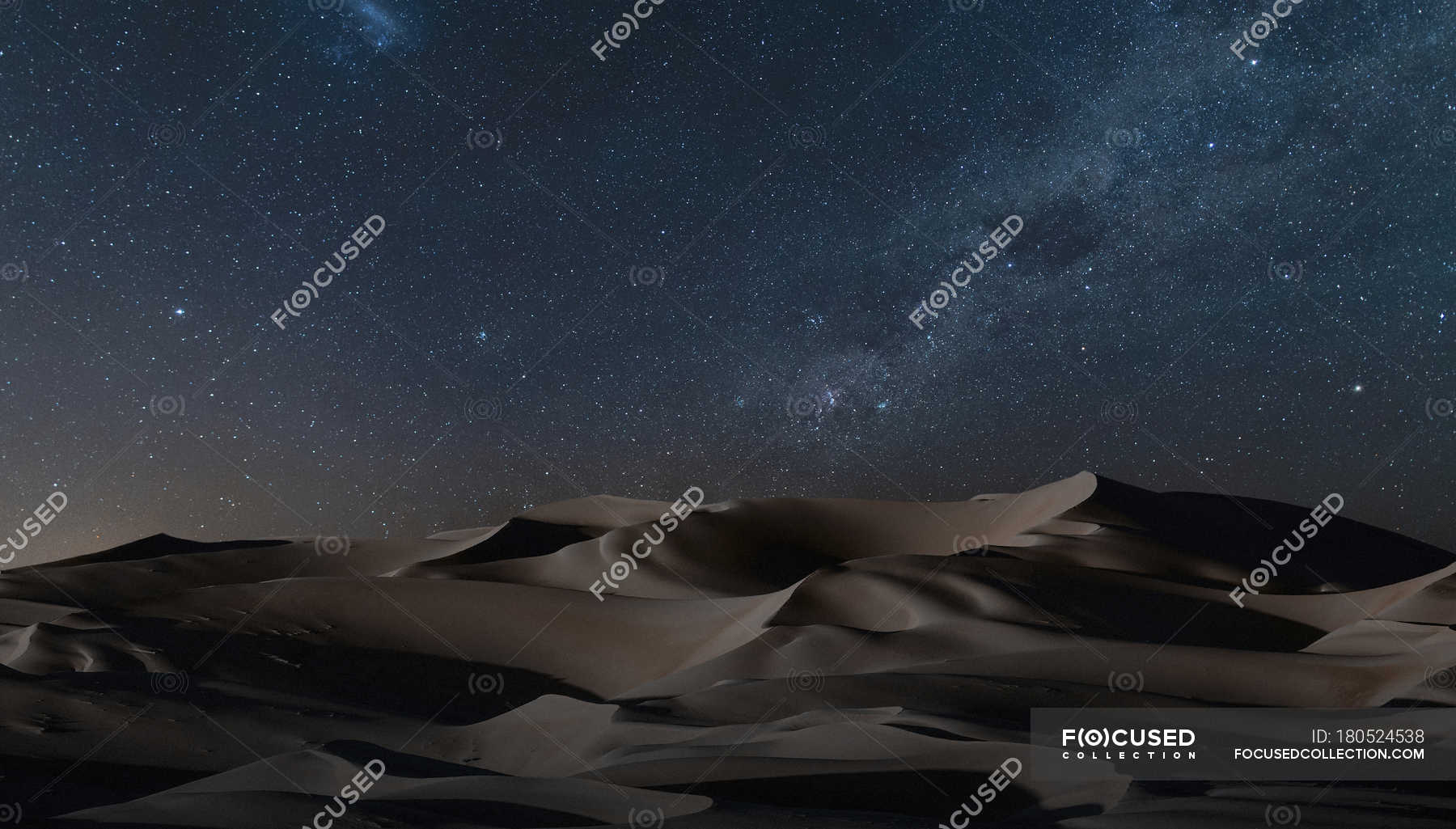 View Of Sand Dunes Under Starry Night Sky Outdoors Namib Desert Stock Photo