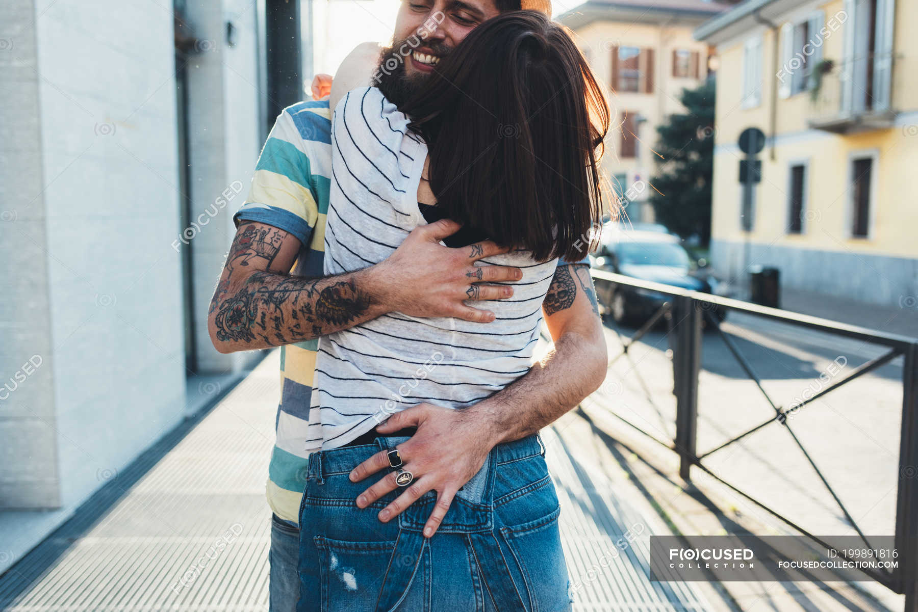 Romantic Couple Hugging On Sidewalk Caucasian Ethnicity Hipsters Stock Photo 199891816