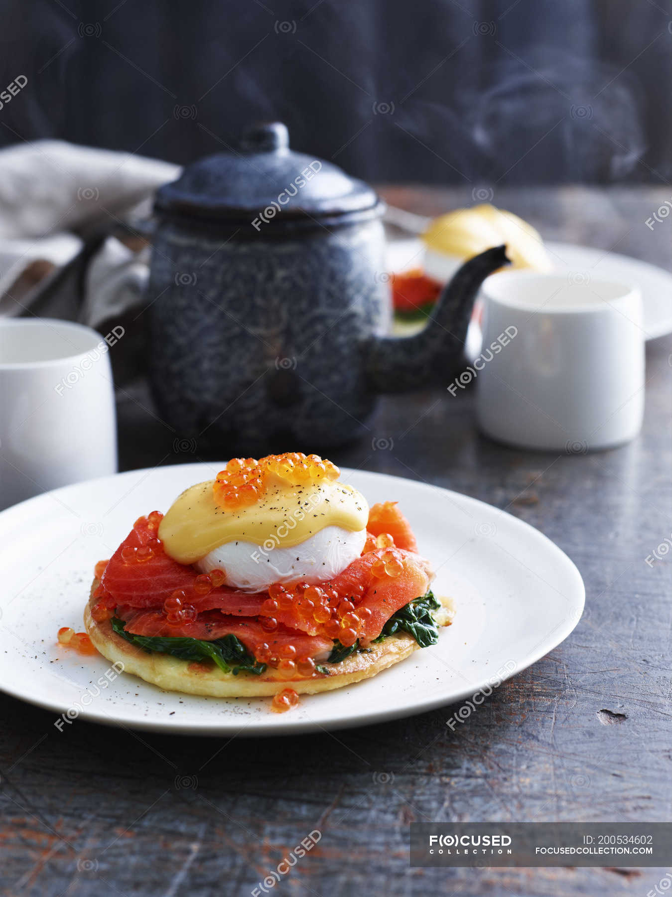 Eggs benedict pizza on white plate — rustic food, Poached Egg Stock