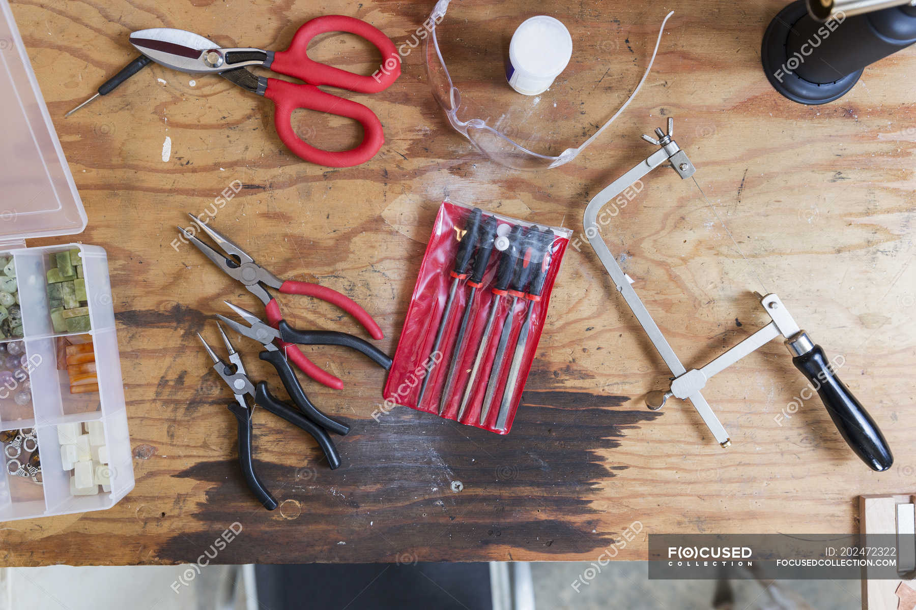 Jewellery Makers Tools On Workbench Overhead View Still Life