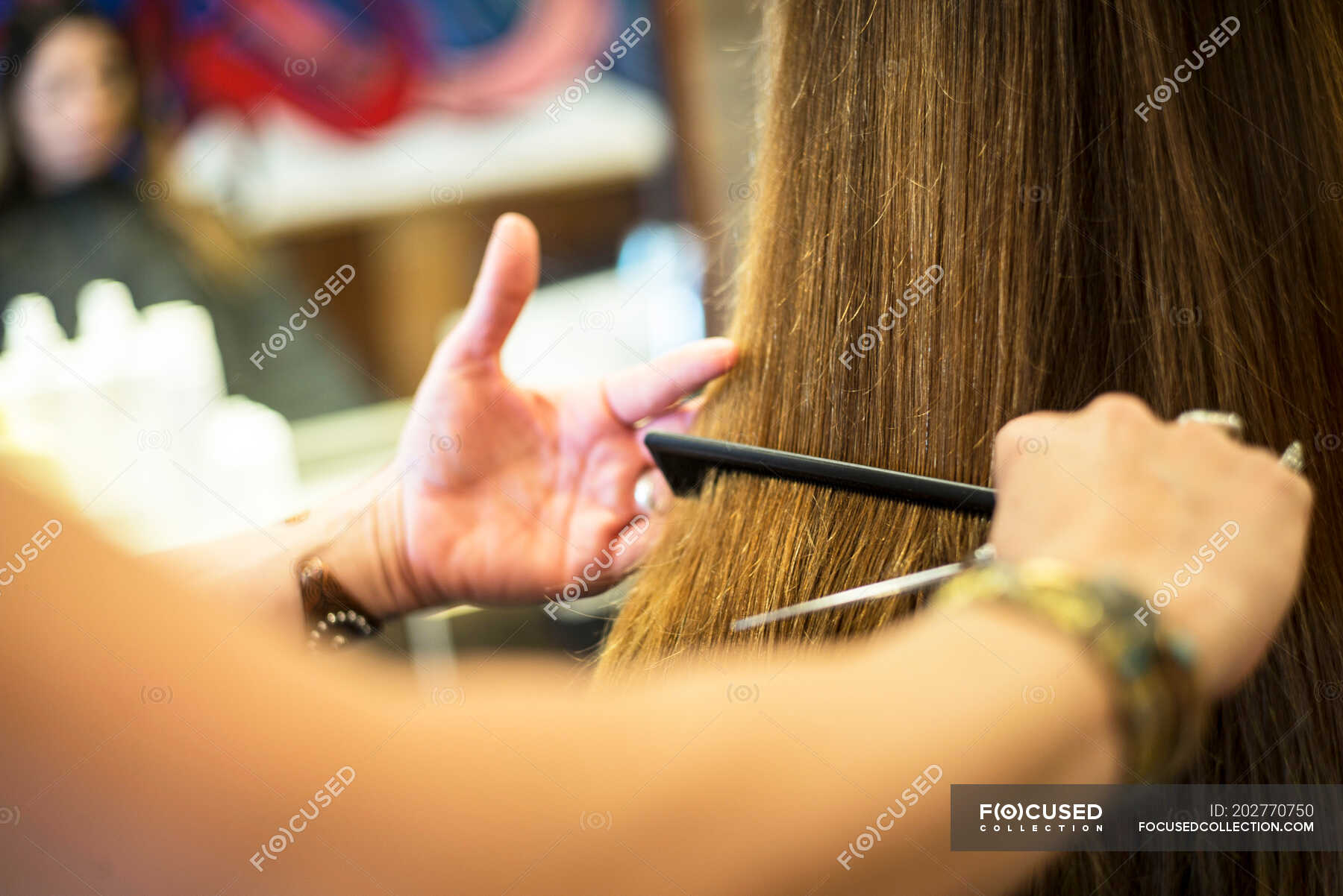 Hairstylist working in salon — indoors, client Stock Photo 202770750