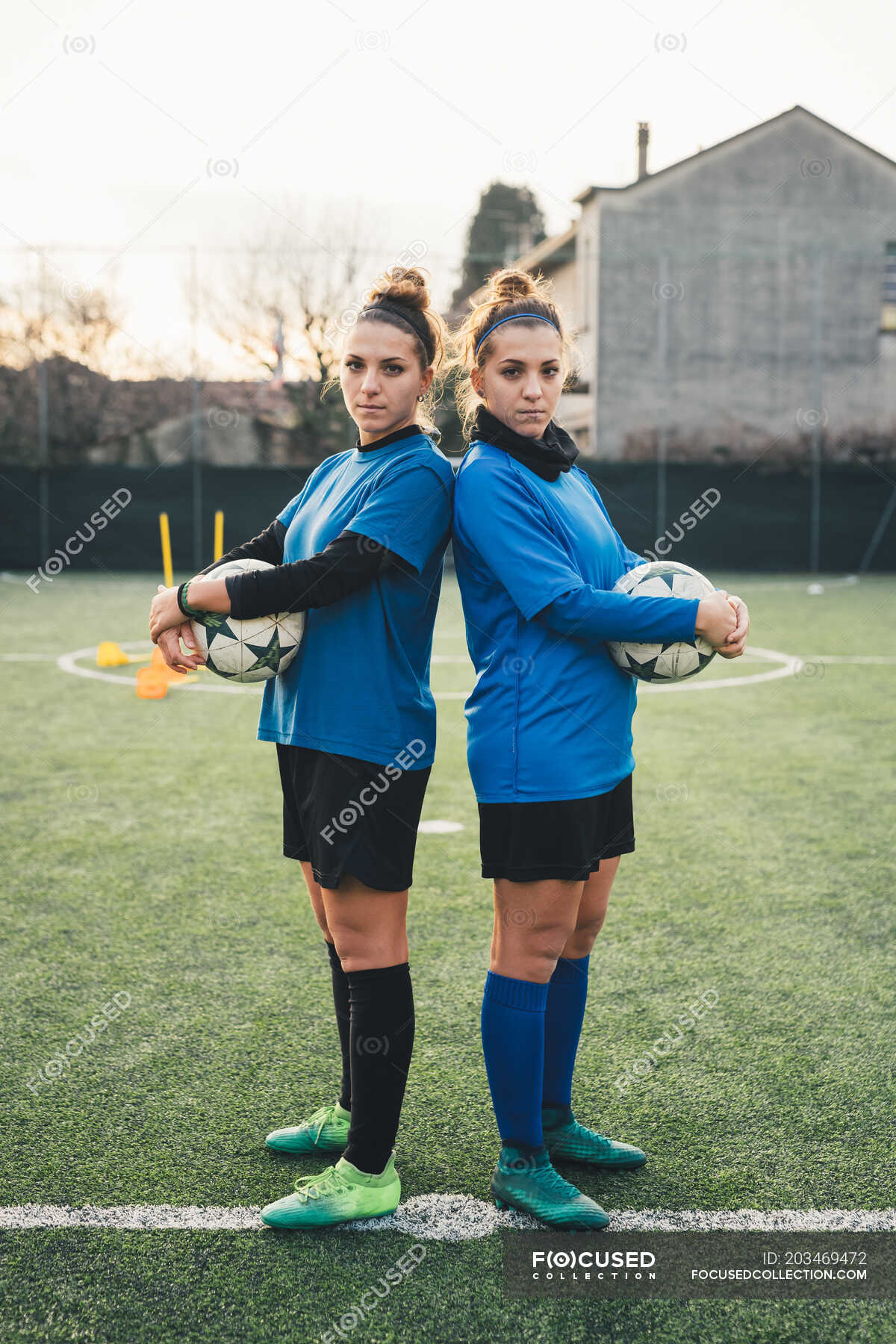 Portrait of female football players — Wearing, girl power Stock Photo