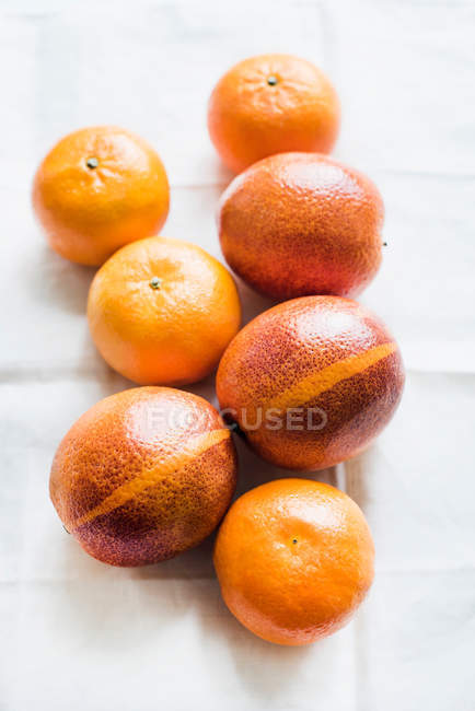 Oranges and tangerines, top view — Stock Photo