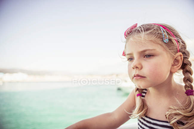Portrait of young girl near water — Stock Photo