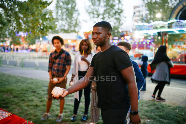 Group of friends at funfair — Stock Photo