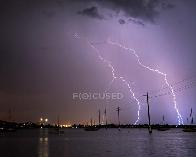 Lightning strikes Stock Photos, Royalty Free Images Focused