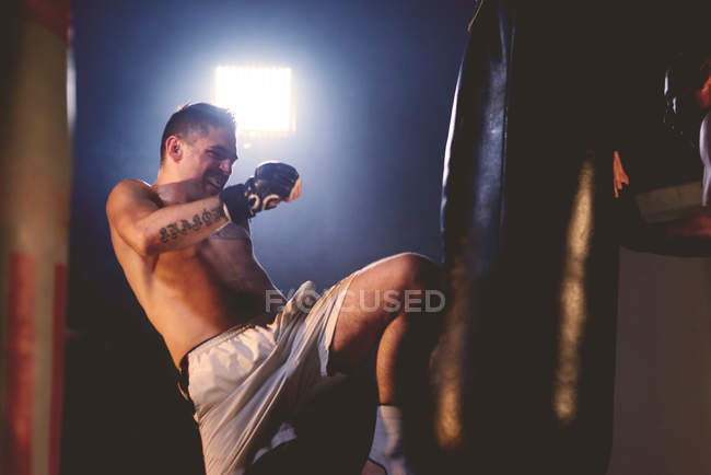 Boxer training in gym — Stock Photo