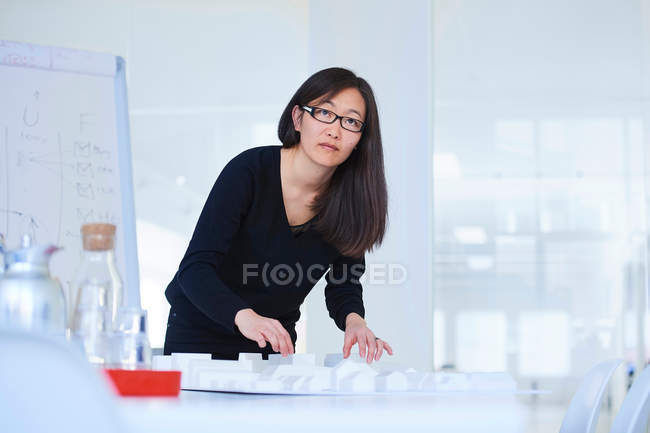 Portrait of businesswoman in architect office — Stock Photo