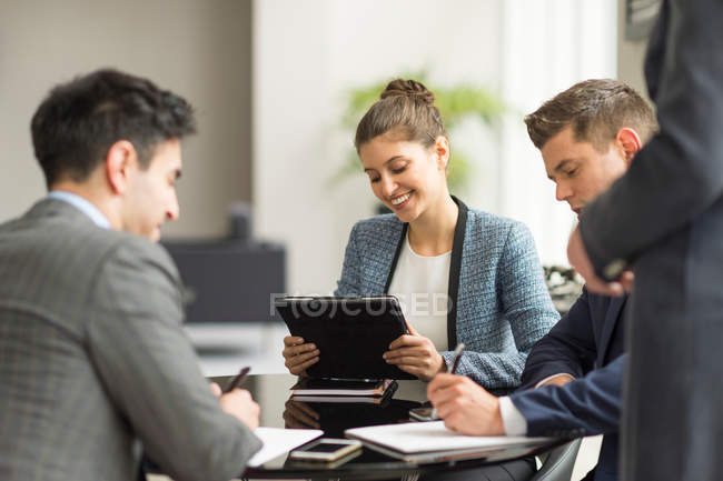 Businessmen and women having office — Stock Photo