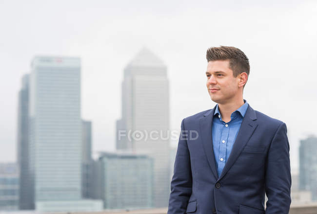 Businessman at office roof terrace — Stock Photo