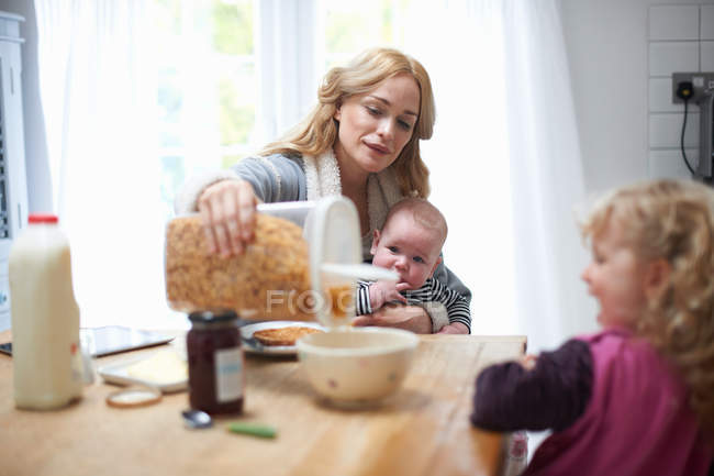 Mother holding baby boy — Stock Photo