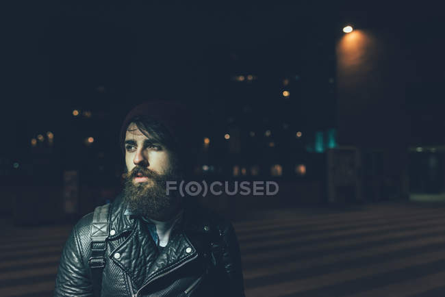 Male hipster on city street — Stock Photo