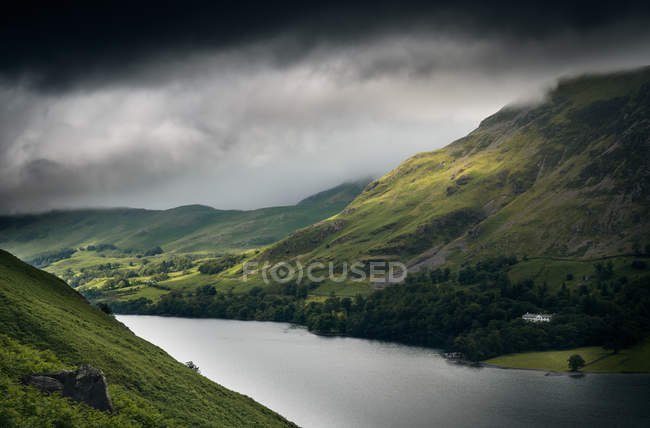 Storm clouds over Buttermere lake — Stock Photo