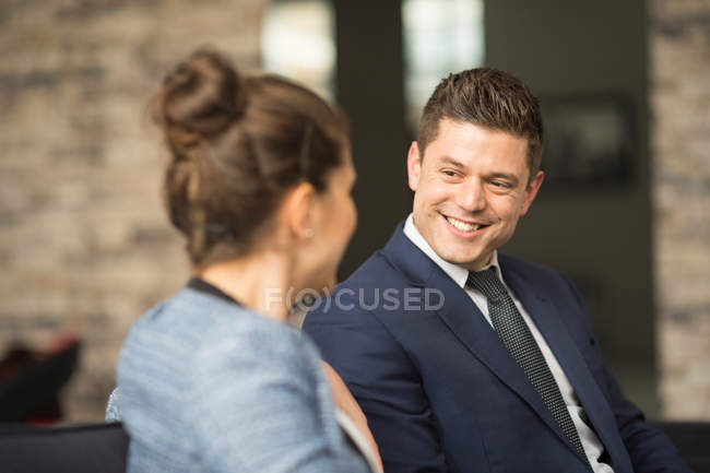 Businessman and woman meeting — Stock Photo