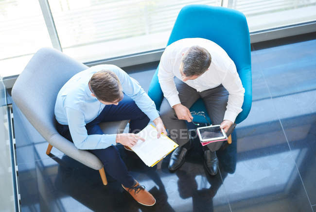 Business men with digital tablet — Stock Photo